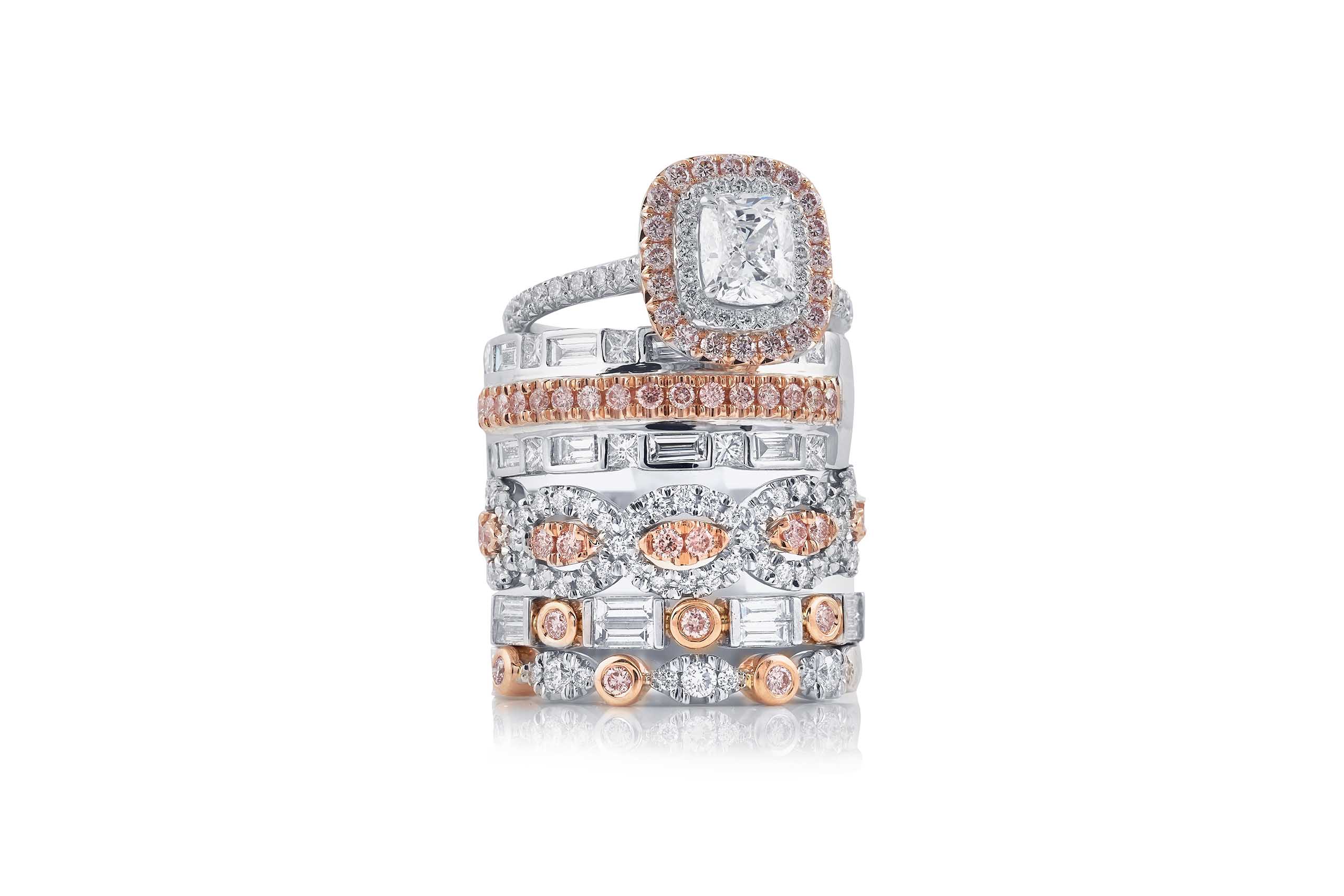 jewellery photography of a stack of diamonds on a white background